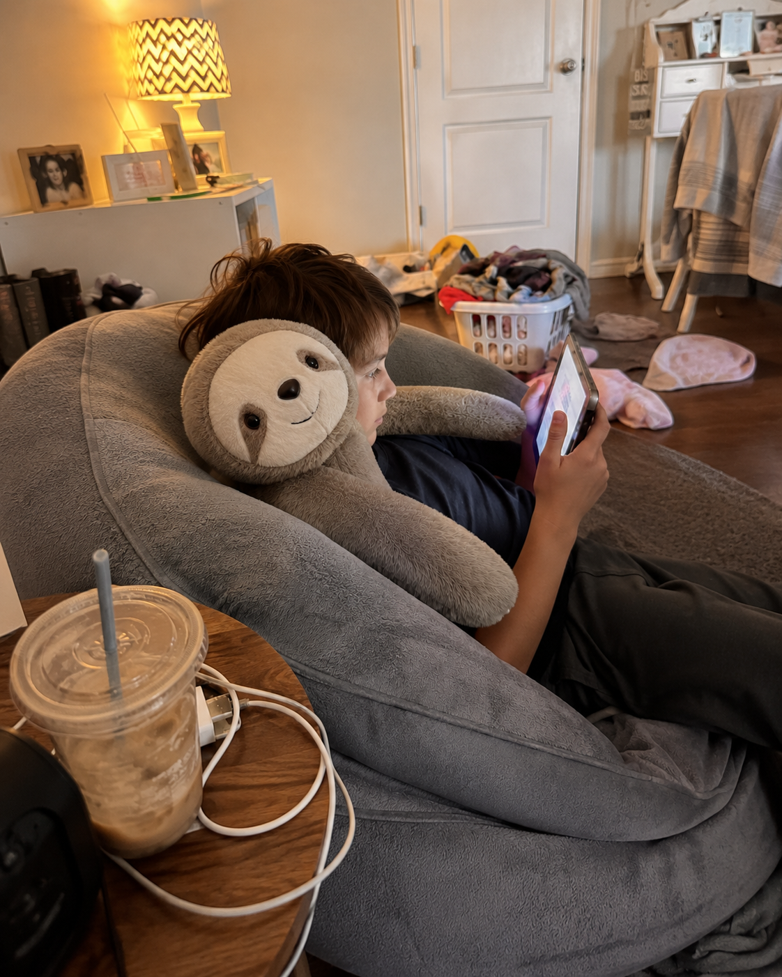 Customer relaxing with Sunny the Sloth
