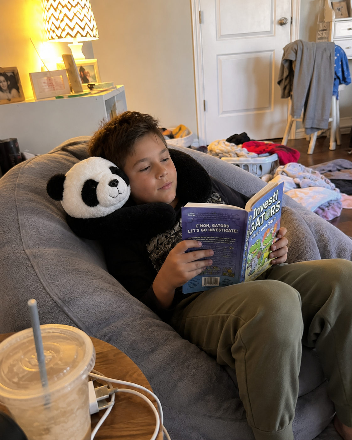 Customer relaxing with Sunny the Sloth